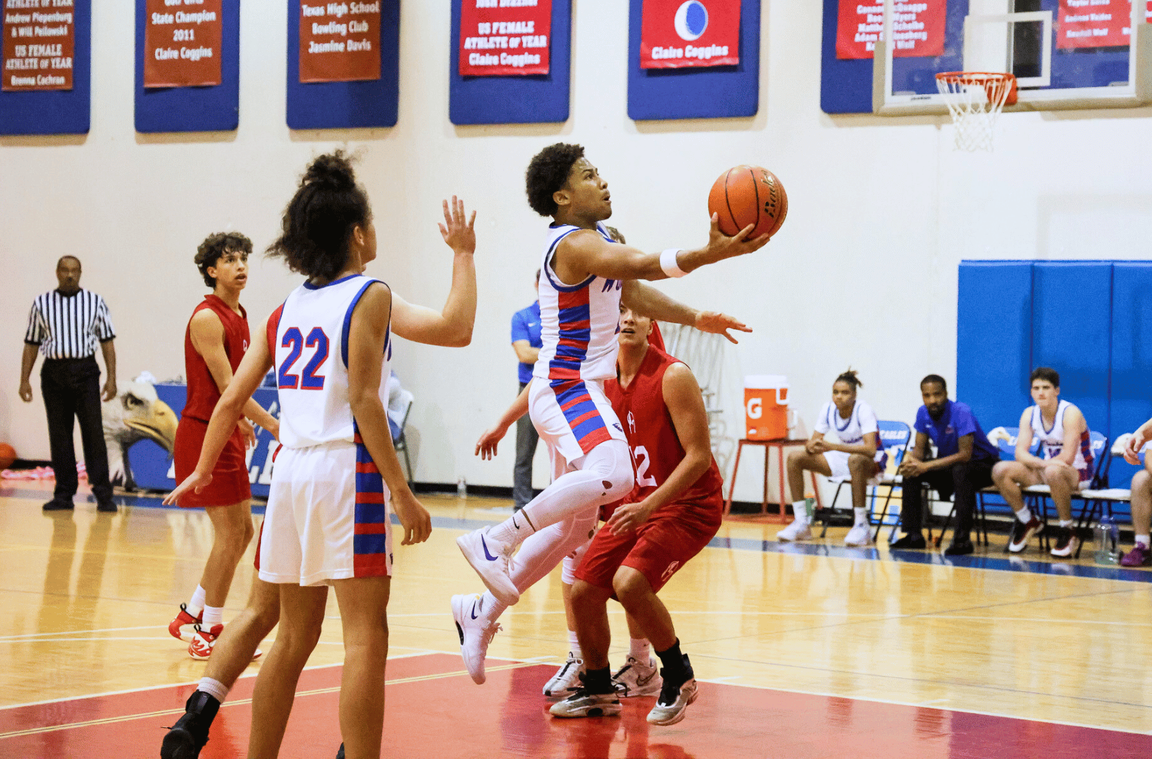 Basketball player going for a lay up at The Winston School in Dallas, Texas.