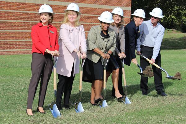 Head of school and board members from The Winston School breaking ground on the new arts center in 2014.